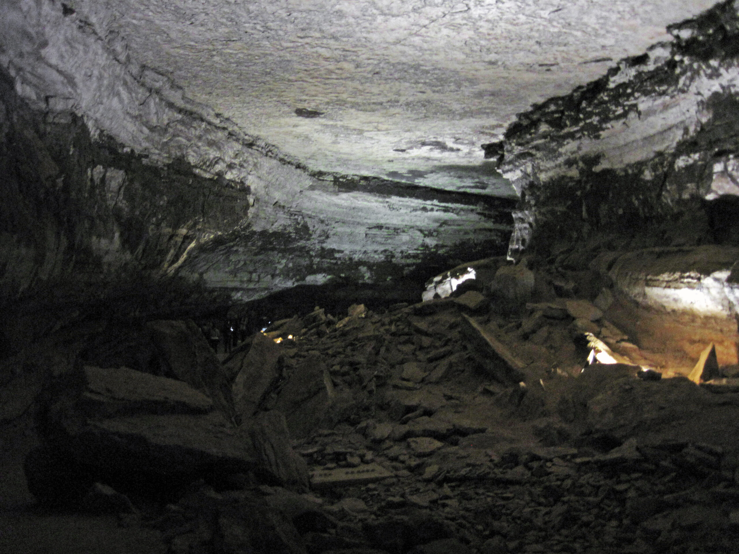 A tall canyon passage in the Main Cave section of Mammoth Cave, Kentucky, showing the scale of the limestone corridors.