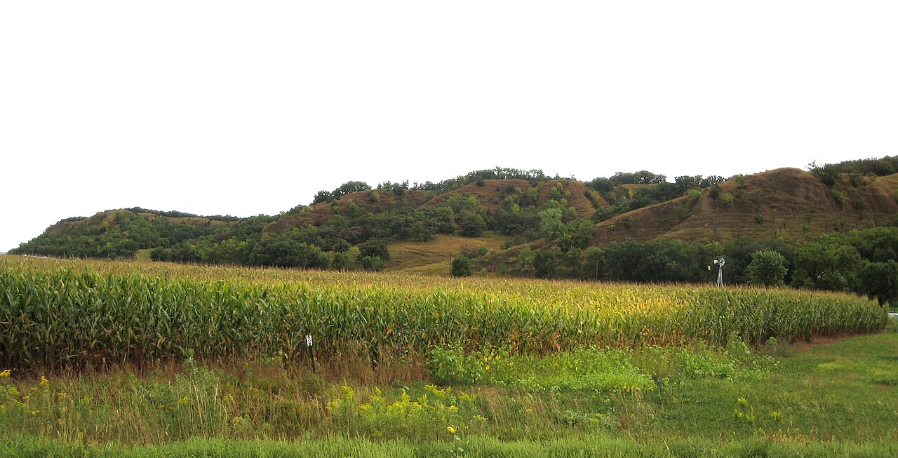 Steep wind-deposited loess hills, the same formation process geologists identify behind Pyramid Mound