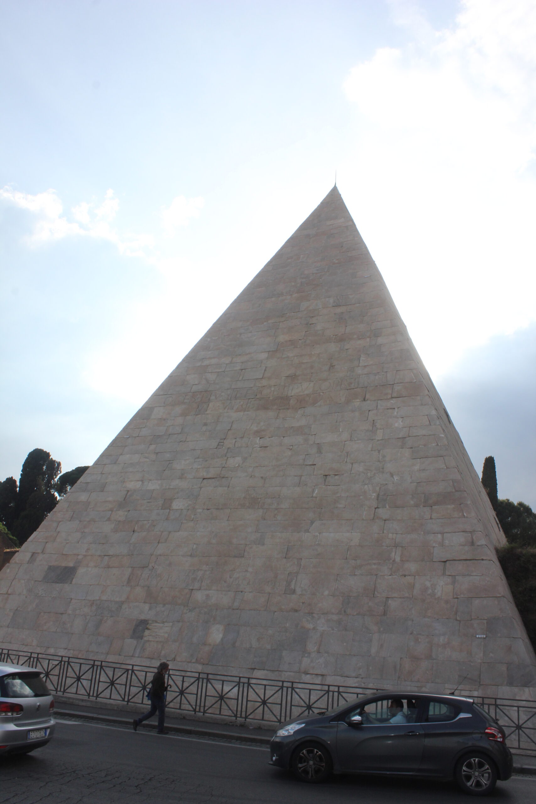 The Pyramid of Cestius, a first-century BCE Roman pyramid tomb faced in white marble, standing in Rome.