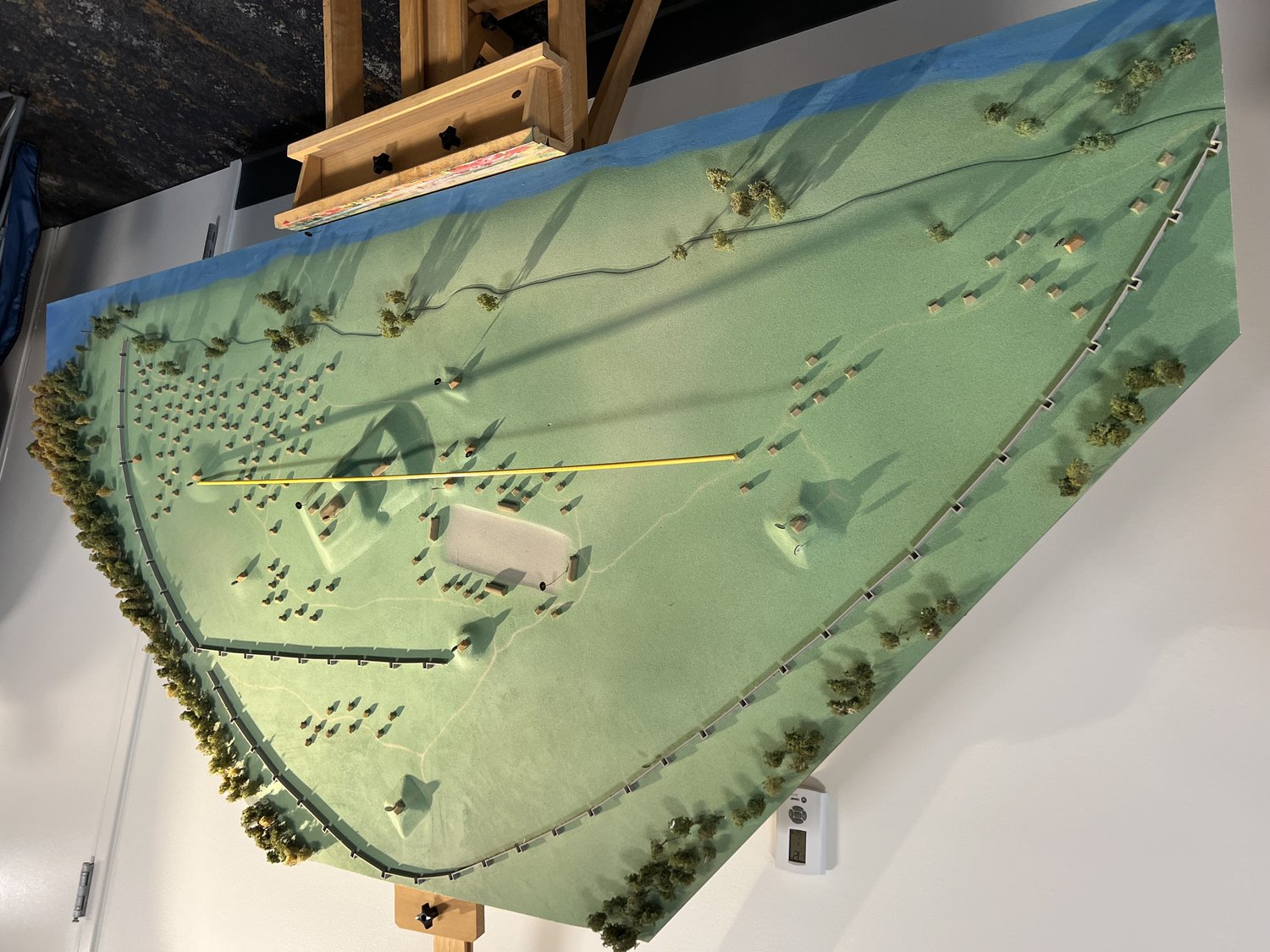 Scale model of the Angel Mounds Mississippian town showing mounds, central plaza and palisade
