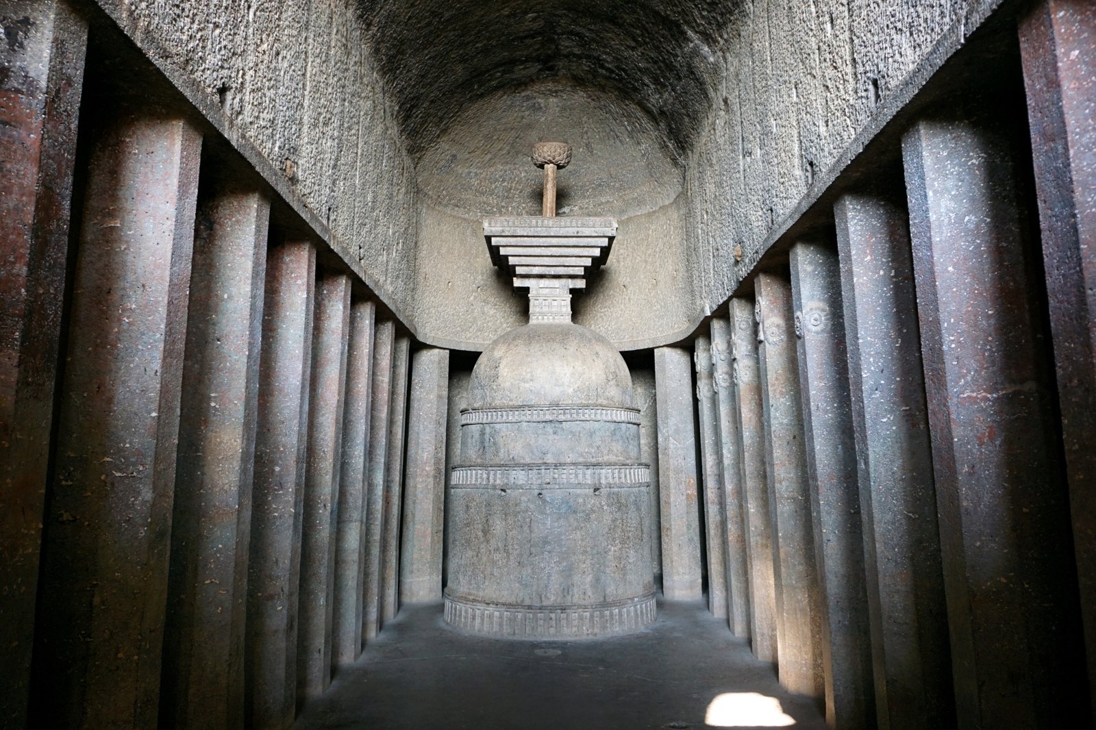 Interior octagonal columns and stupa of the Bedse chaitya hall, Maval, Maharashtra.