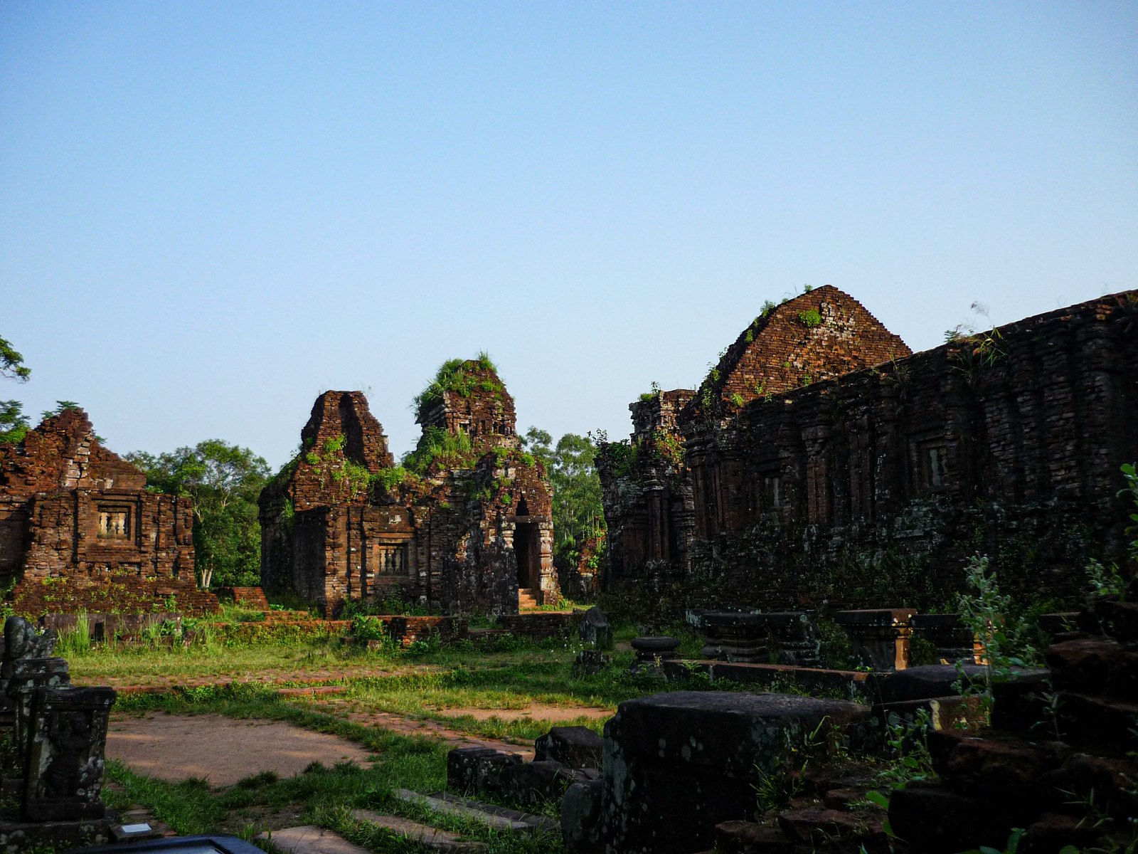 Weathered red-brick Cham kalan sanctuary towers at My Son with carving cut directly into the brick
