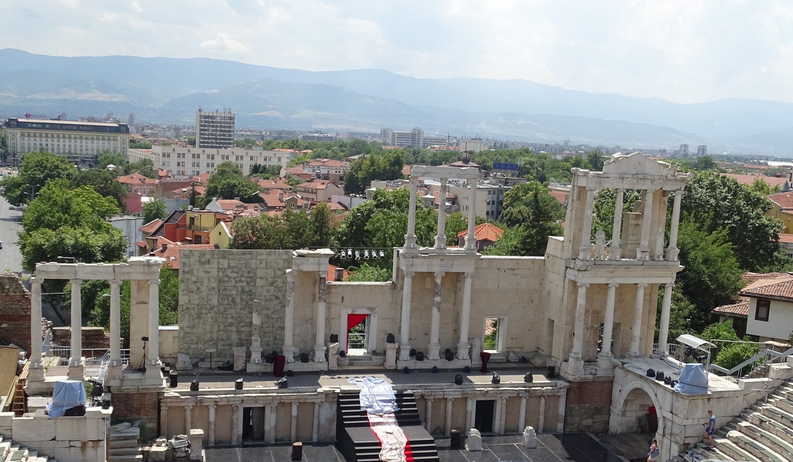 The Roman theatre of Philippopolis looking across the horseshoe orchestra toward the three-storey scaenae frons stage building.