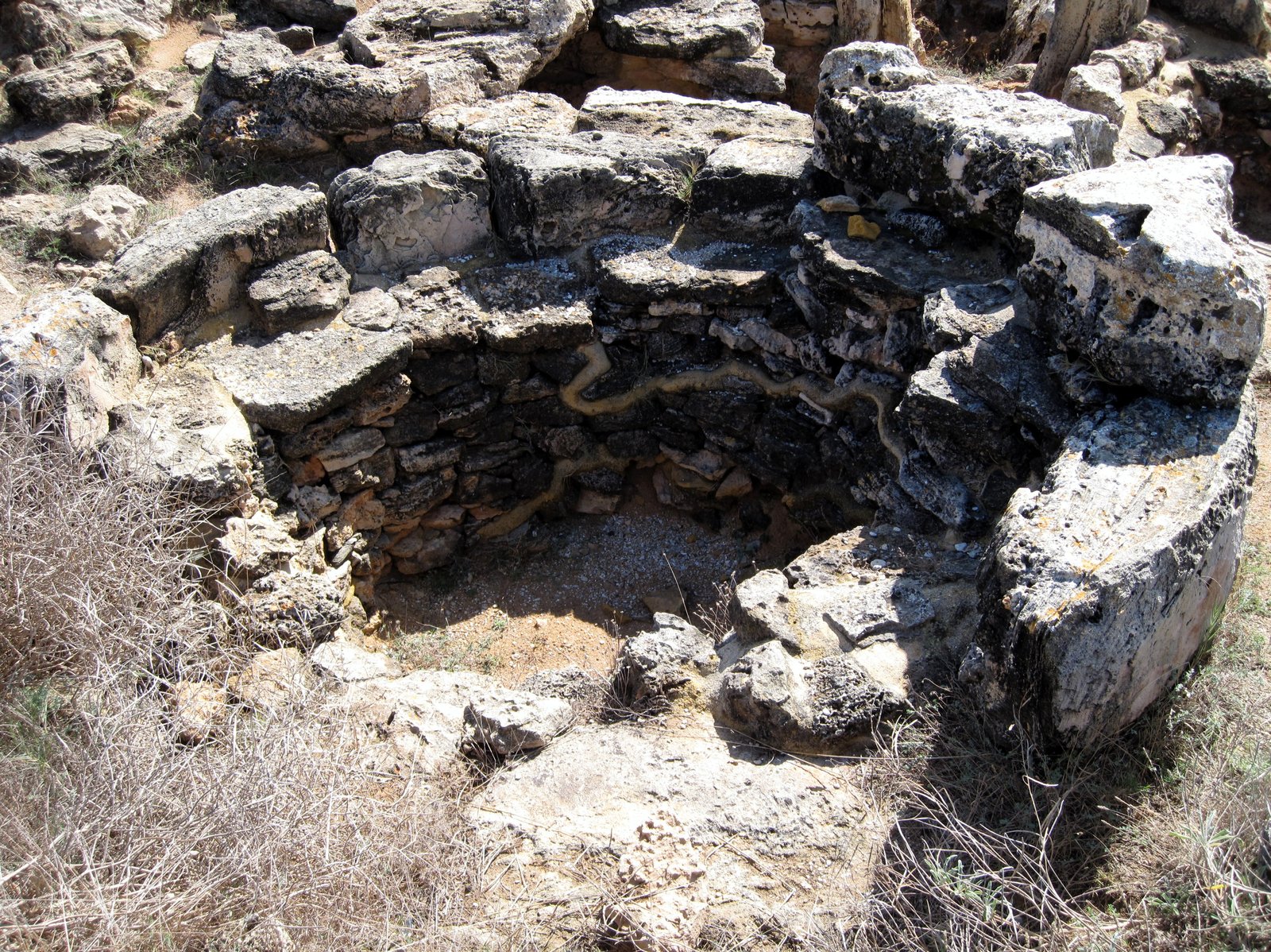 Cluster of miniature naviform and circular ashlar tombs at the Son Real necropolis, Santa Margalida, Mallorca
