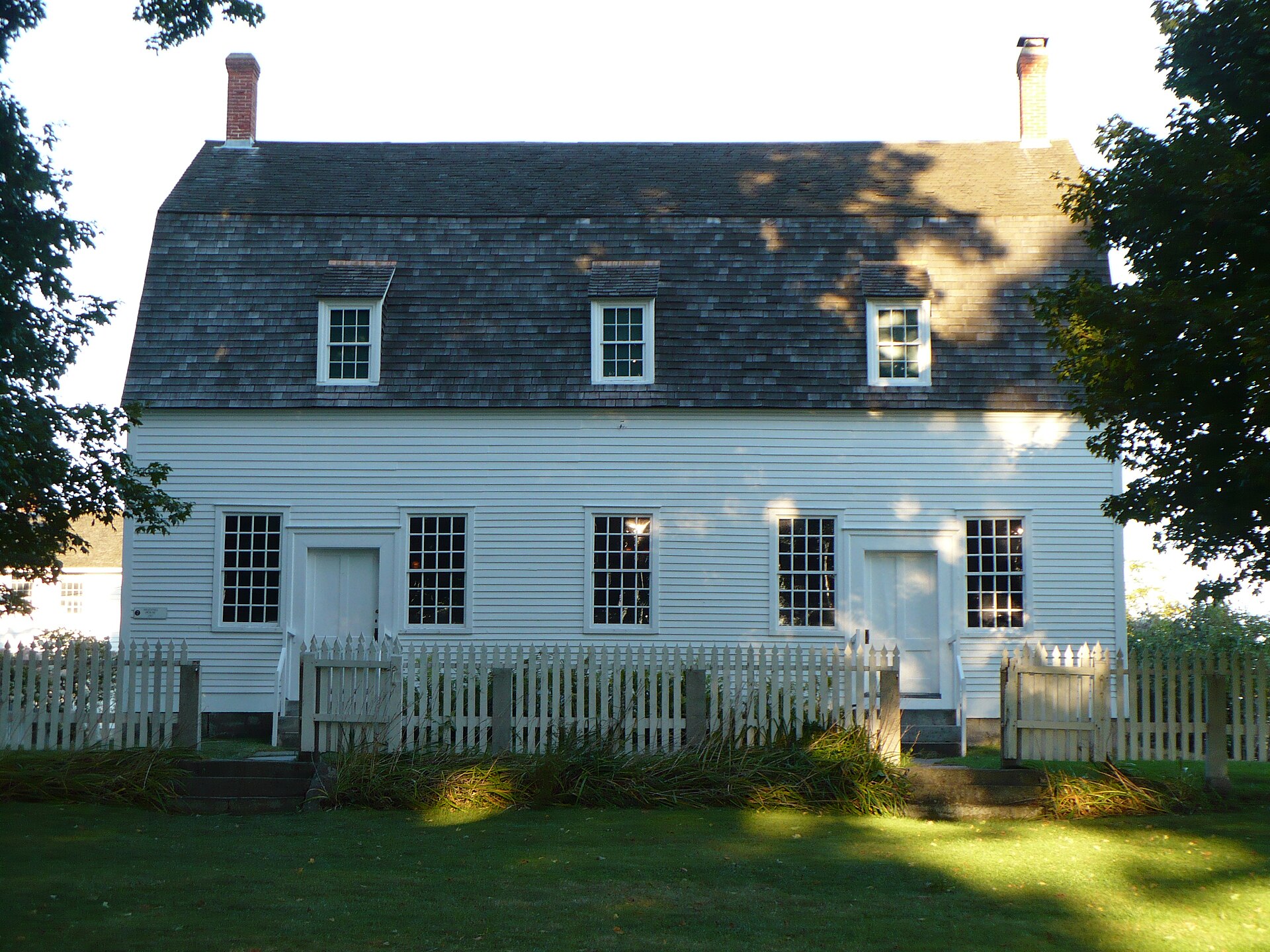 The white clapboard Shaker Meeting House at Canterbury Shaker Village, New Hampshire