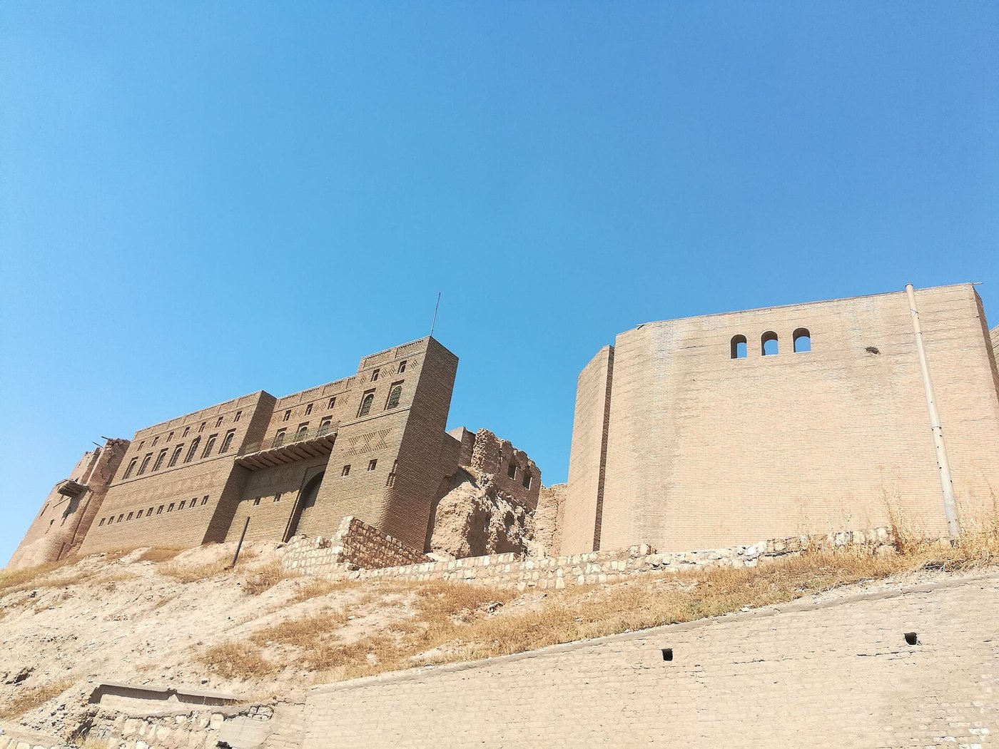 The tell and perimeter facade of Erbil Citadel in the Kurdistan Region of Iraq, a UNESCO World Heritage Site